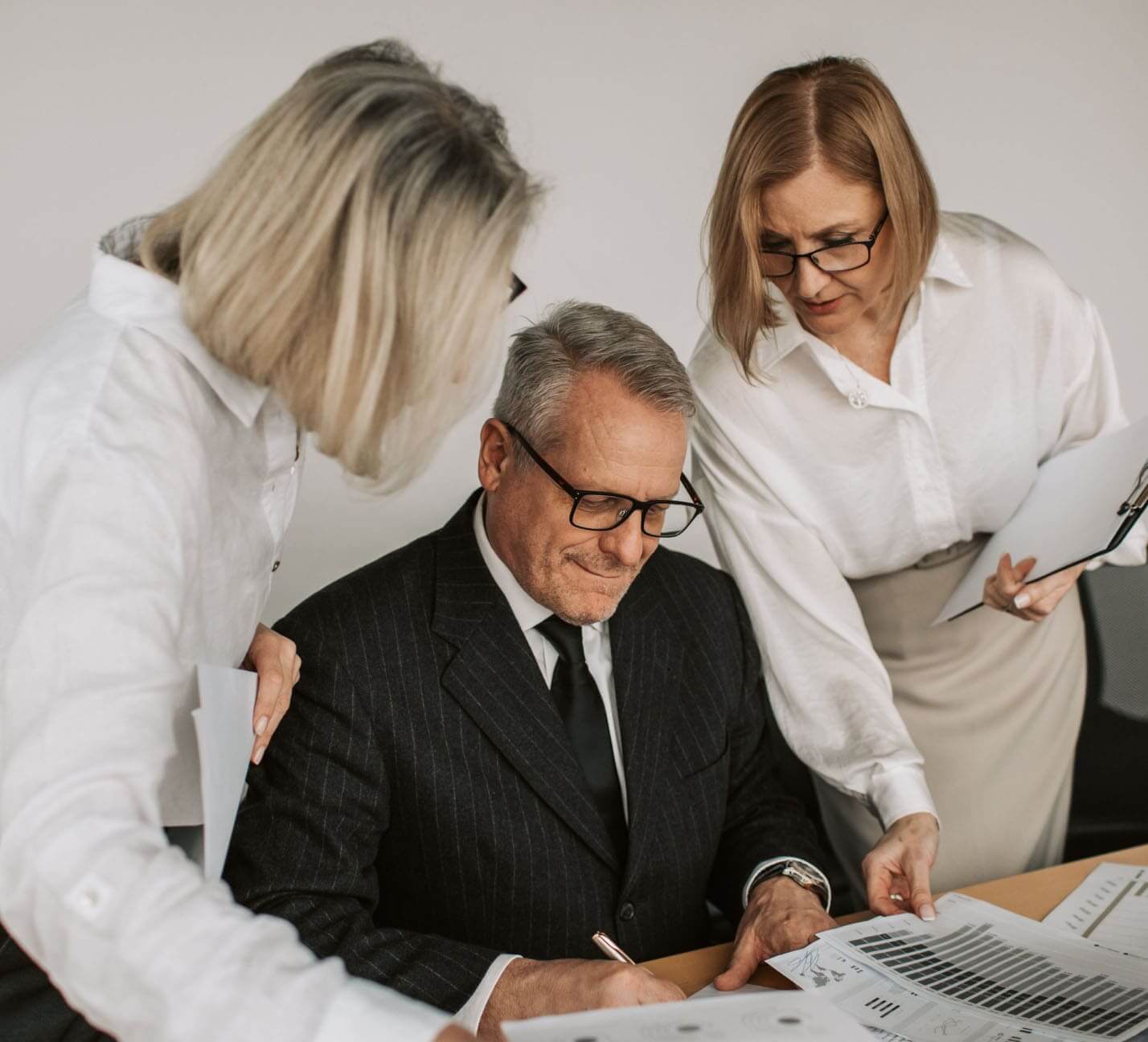 A benefits advisor reviewing plan options with clients