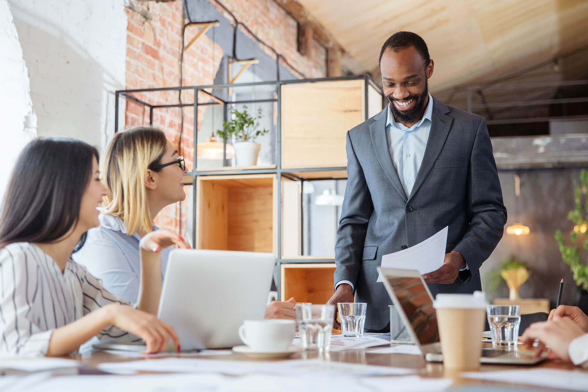 An Enrollment Guide consultant walking employees through their benefits options