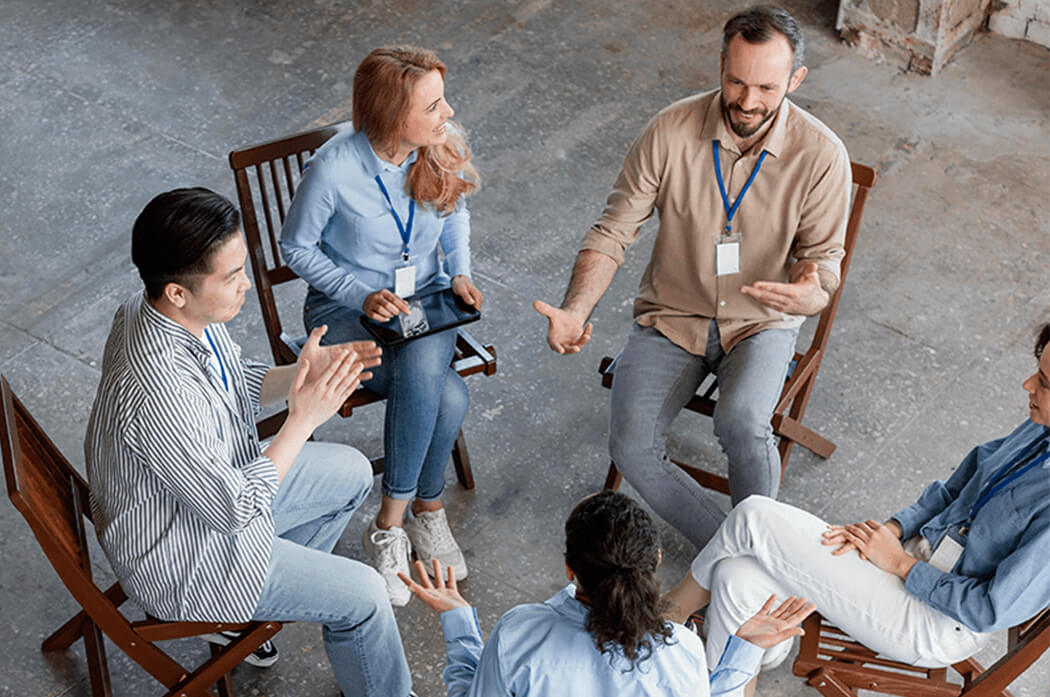 Employees in an open-enrollment consultation session