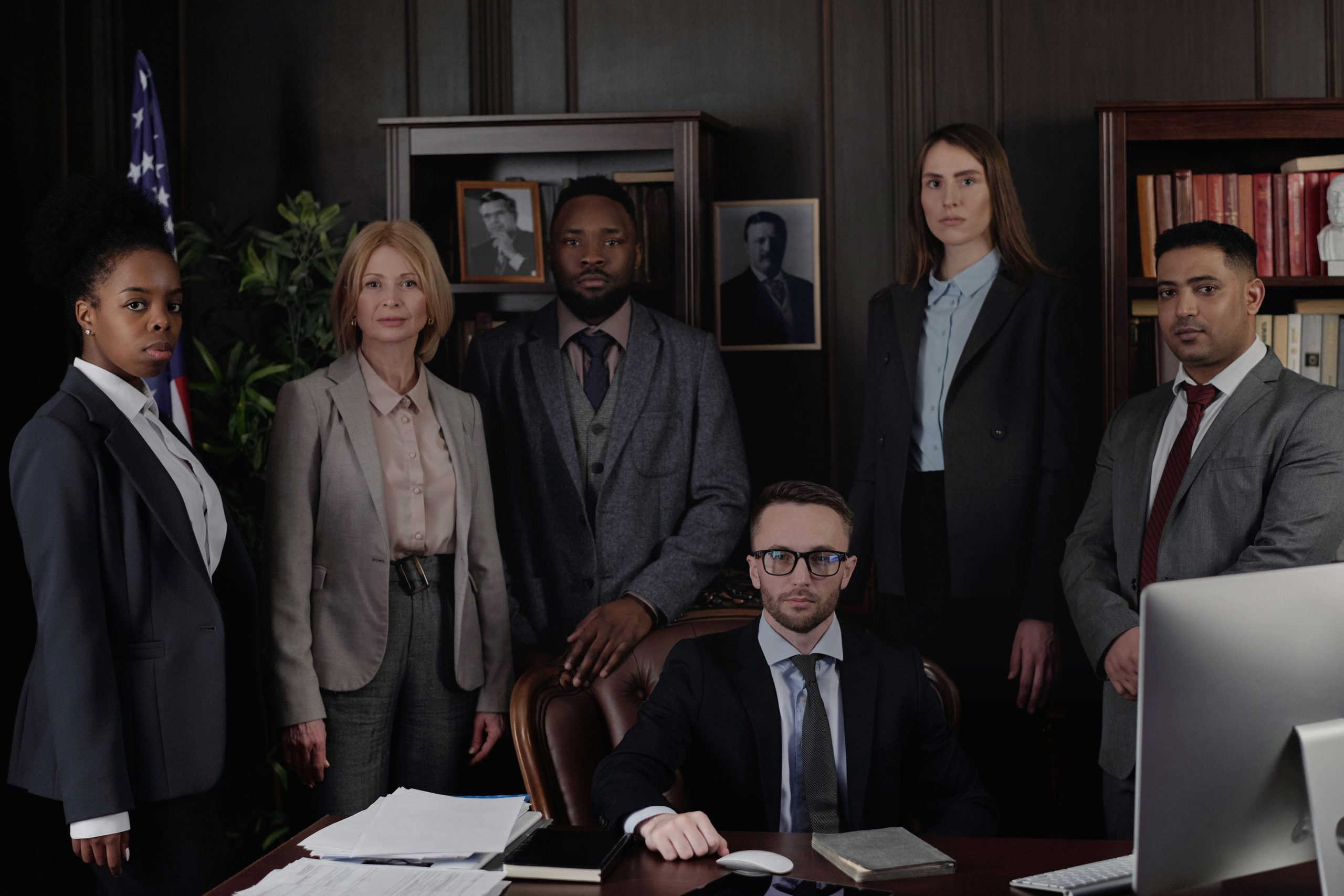 The Enrollment Guide team of benefits consultants in their office